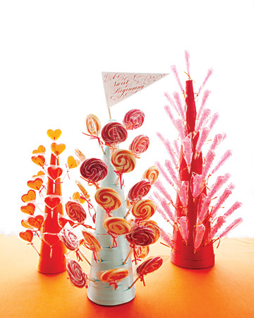 Something like a candy buffet these lollipop trees are a clever way to hold